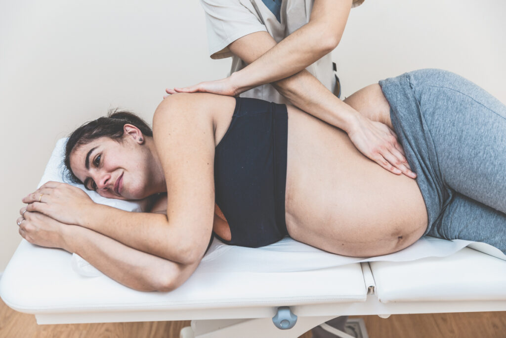 Denver-Sports-Massage-Stock-Photos-63-physiotherapist-giving-massages-to-the-back-of-a-p-2022-03-05-23-03-52-utc